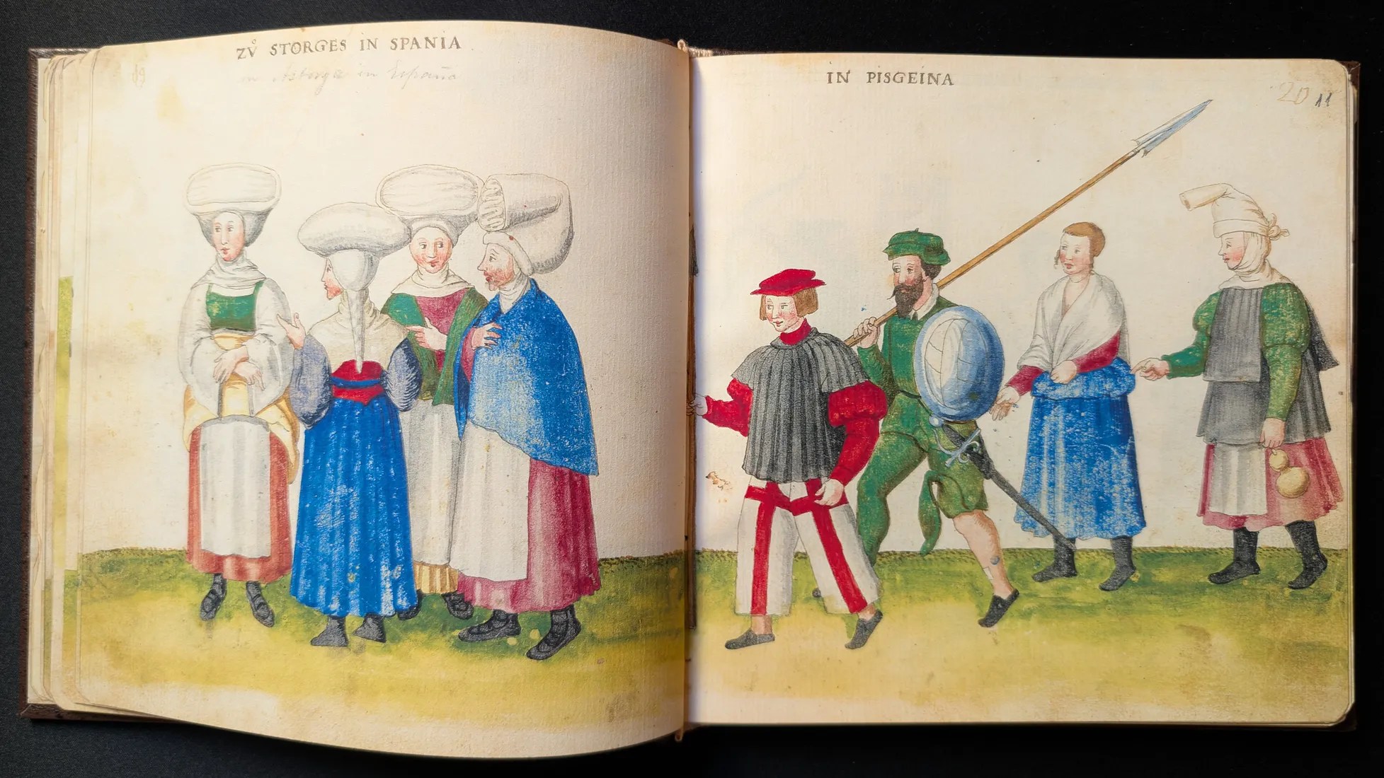 Imagen del facsímil del Códice de Trajes: Folios 10v-11r, mujeres de Galicia y mujeres y hombres vascos, Editorial PIAF