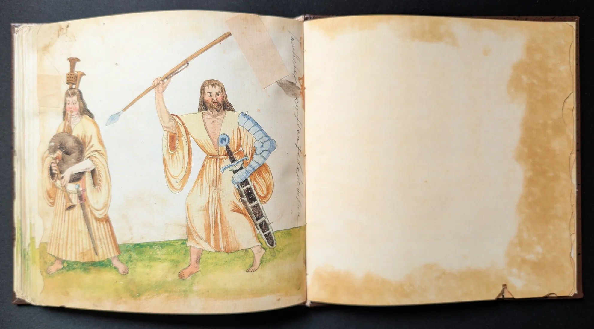 Imagen del facsímil del Códice de Trajes: Folios 64v-65r, Hombres de Irlanda, Editorial PIAF